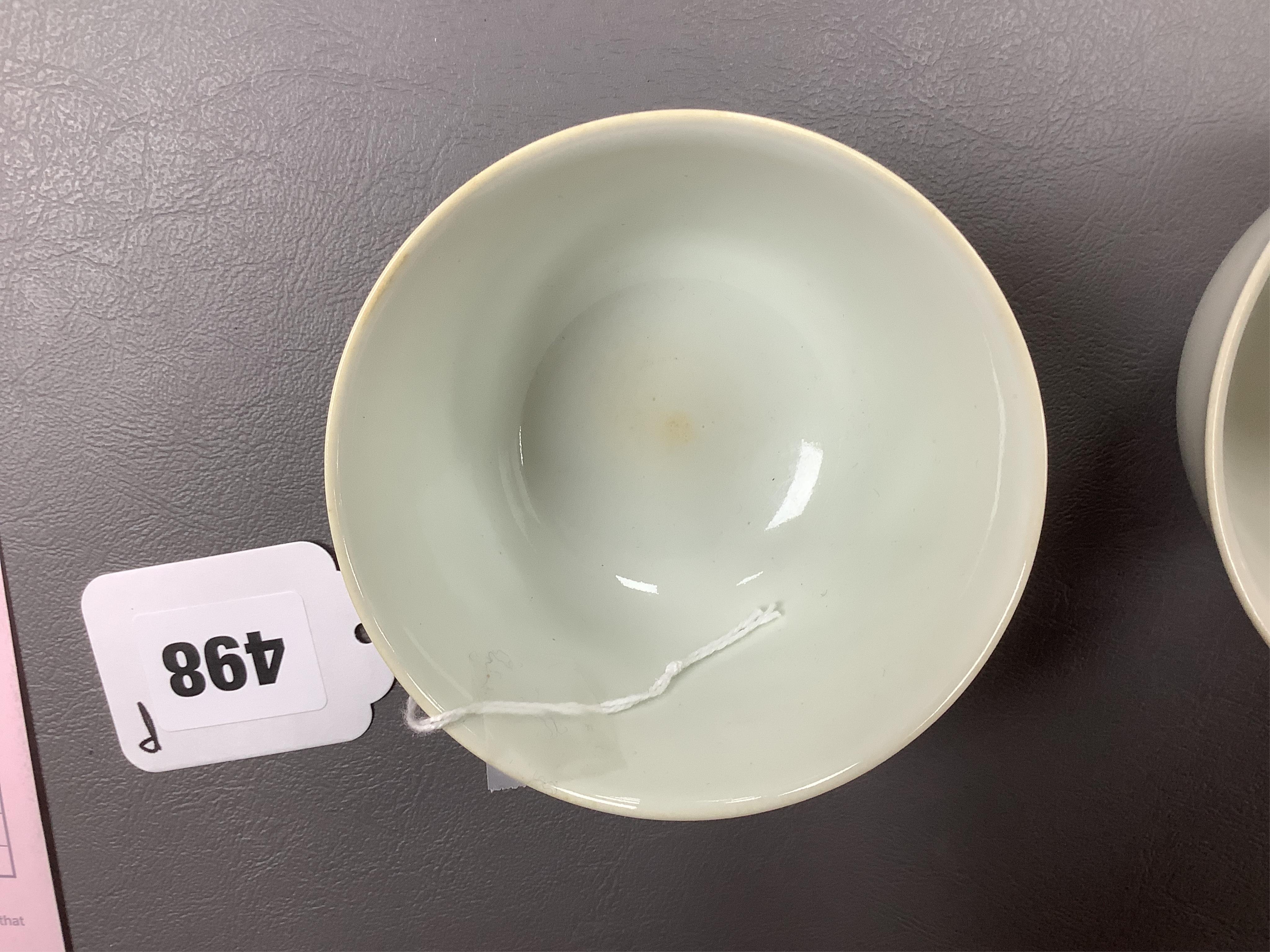 A pair of Chinese white glazed porcelain tea bowls, 6cm high